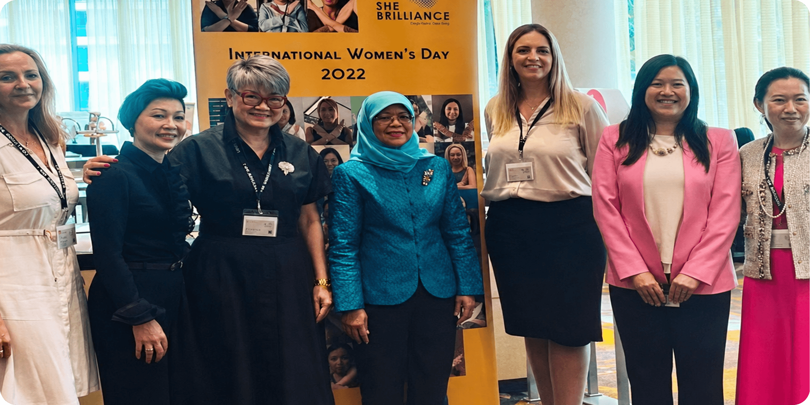 Suzanne Lilley with leaders at an International Women's Day community event