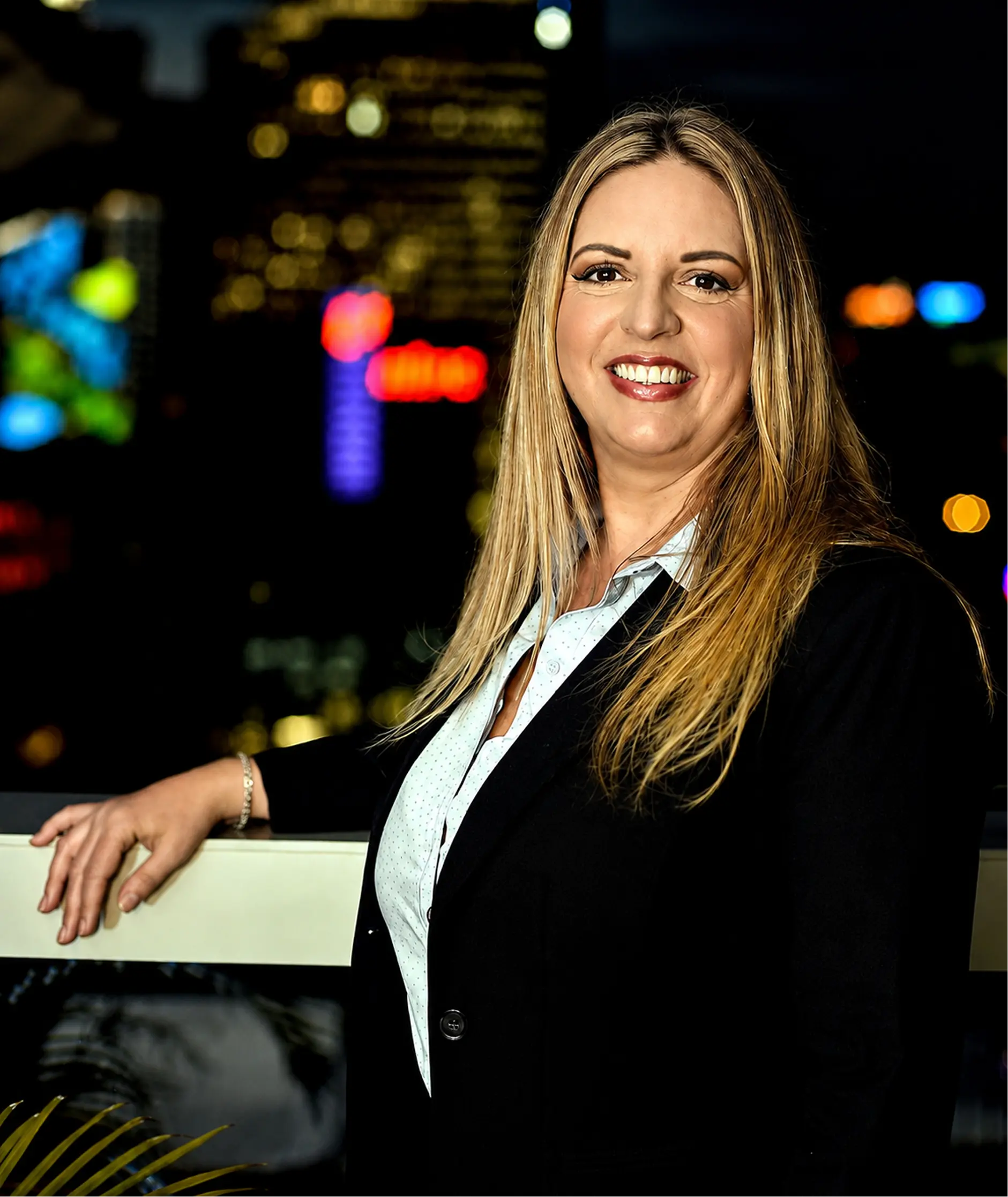 Suzanne Lilley overlooking a city skyline